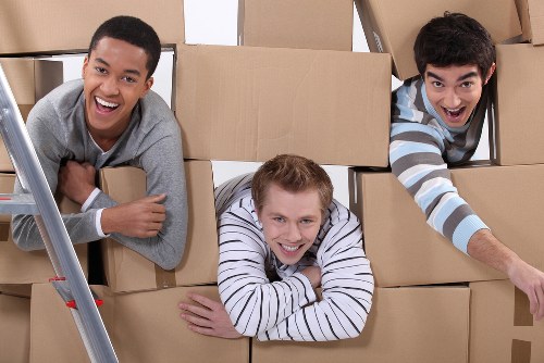 Packed boxes and furniture ready for temporary storage in Homerton