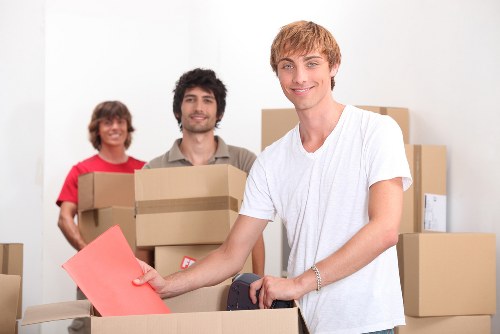 Packing and moving office furniture during a Homerton business relocation